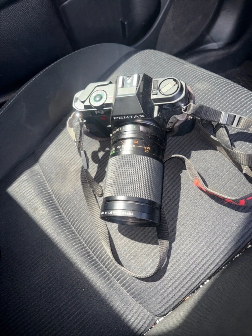 Pentax Black SLR Camera with Telephoto Lens